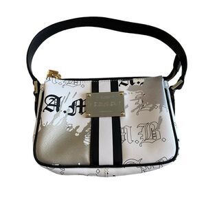 🌟🌟 HOST PICK🌟🌟 NWOT L.A.M.B. Clutch Purse